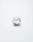 Silver ring on a white background