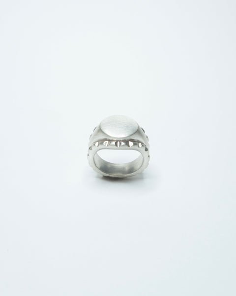 Silver ring on a white background